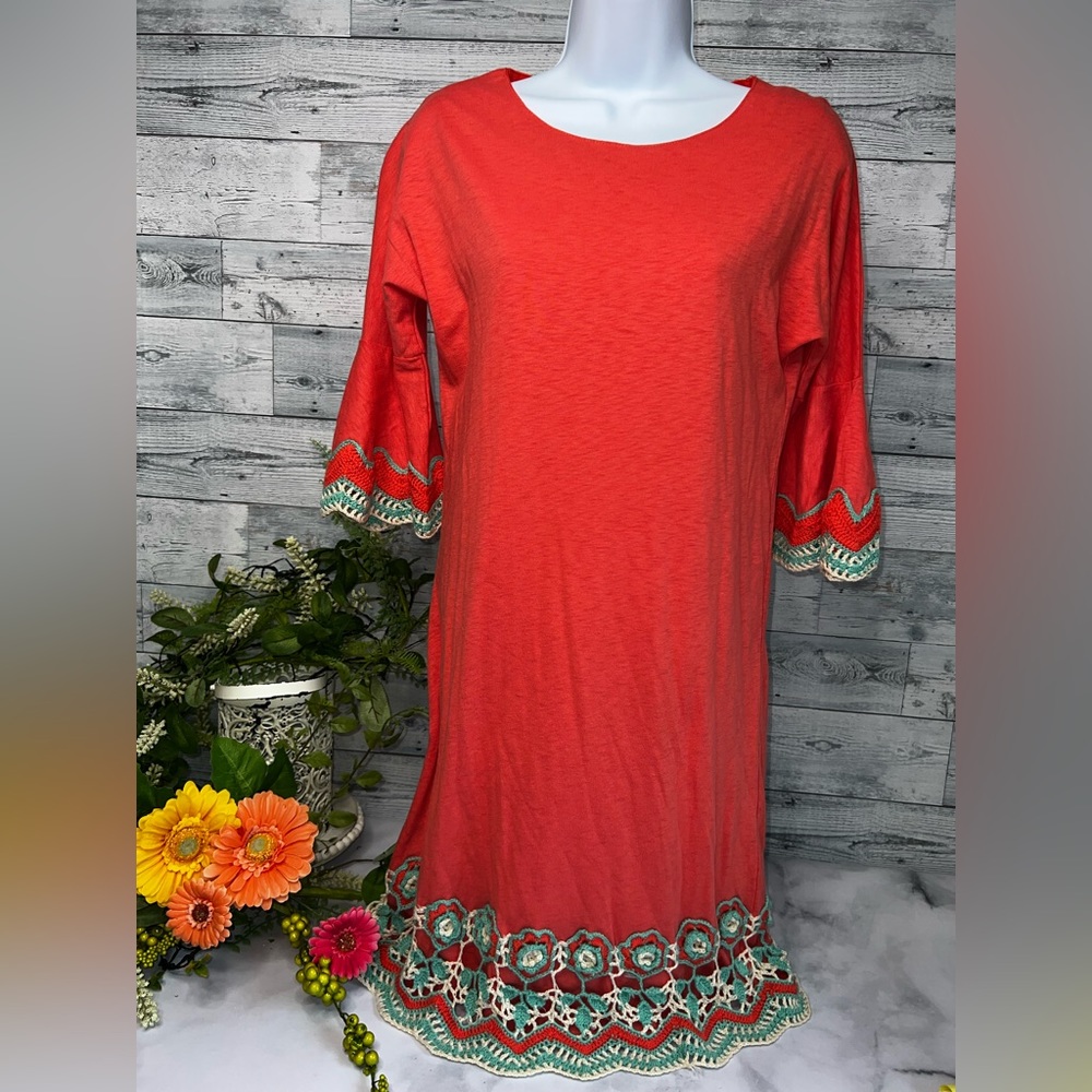 Southern Fashion Size Small Coral with crochet sleeves and hem.